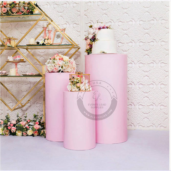 pink cylinder stands