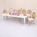 white dining table set for events